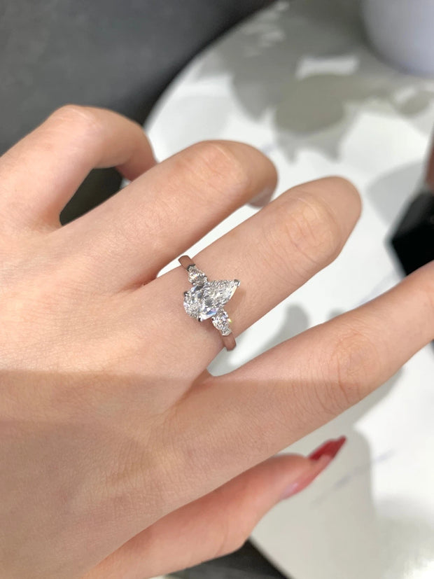 Radiate elegance with this stunning 1.01 CT lab-grown pear-shaped diamond ring.