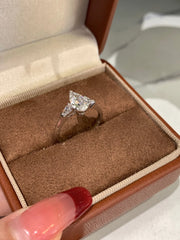 Radiate elegance with this stunning 1.01 CT lab-grown pear-shaped diamond ring.